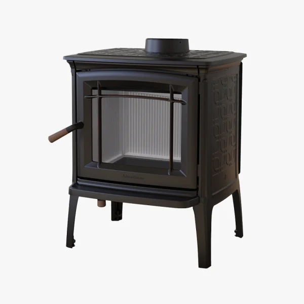 Hergom Craftsbury HF är en vedeldad kamin i svart gjutjärn med glasdörr, sidohandtag och dekorativa sidomönster, med fyra robusta ben och visas mot en vit bakgrund.